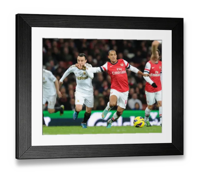 Framed Print : Theo Walcott Outmaneuvers Leon Britton: Arsenal vs Swansea City, Premier League 2012-13 Framed Print : Theo Walcott Outmaneuvers Leon Britton: Arsenal vs Swansea City, Premier League 2012-13