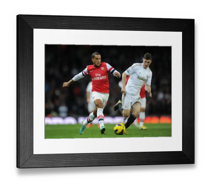 Framed Print : Theo Walcott vs. Ben Davies: A Premier League Battle at Emirates Stadium (Arsenal vs. Swansea, 2012-13) Framed Print : Theo Walcott vs. Ben Davies: A Premier League Battle at Emirates Stadium (Arsenal vs. Swansea, 2012-13)
