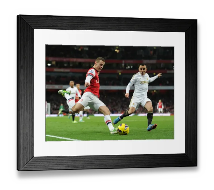 Framed Print : Battle for Midfield Supremacy: Jack Wilshere vs. Leon Britton (2012) - Arsenal vs. Swansea City