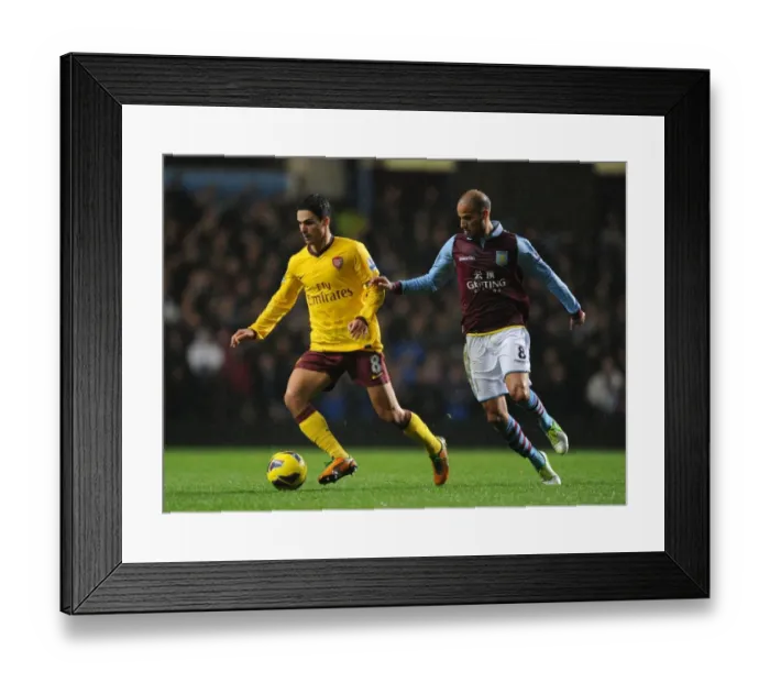 Framed Print : Mikel Arteta vs. Karim El Ahmadi: Battle for Ball Possession (Aston Villa vs. Arsenal, 2012-13) Framed Print : Mikel Arteta vs. Karim El Ahmadi: Battle for Ball Possession (Aston Villa vs. Arsenal, 2012-13)