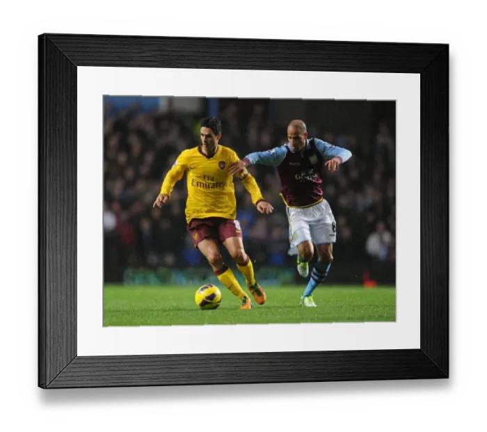 Framed Print : Mikel Arteta vs. Karim El Ahmadi: A Battle for Ball Possession (Aston Villa vs. Arsenal, 2012-13) Framed Print : Mikel Arteta vs. Karim El Ahmadi: A Battle for Ball Possession (Aston Villa vs. Arsenal, 2012-13)