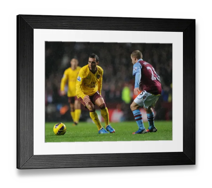 Framed Print : Santi Cazorla vs. Barry Bannan: Clash of Midfielders in Aston Villa vs. Arsenal (2012-13)