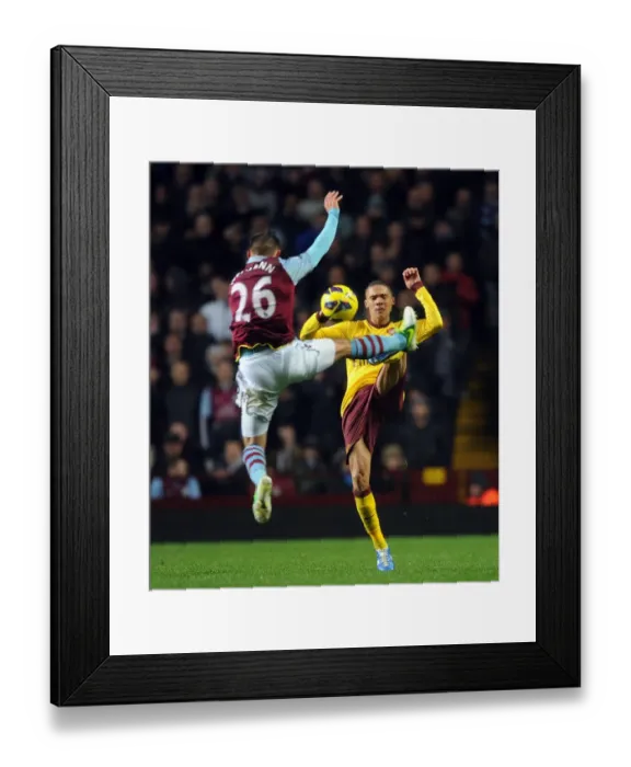 Framed Print : Clash at Villa Park: Gibbs vs. Weimann in Premier League Showdown