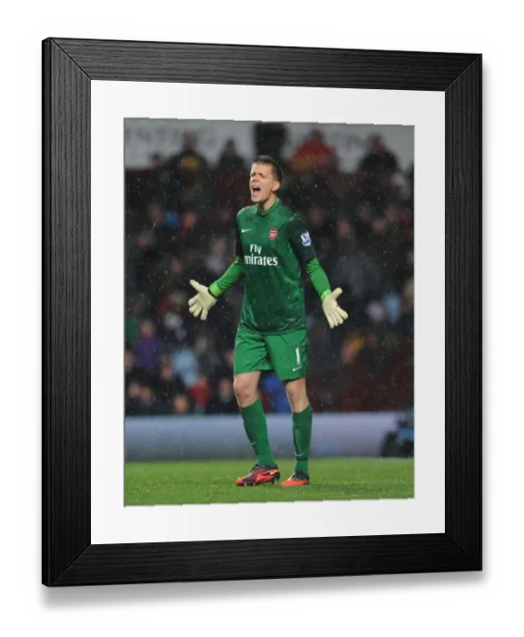 Framed Print : Wojciech Szczesny: Unyielding Guardian of Arsenal at Villa Park (2012-13) Framed Print : Wojciech Szczesny: Unyielding Guardian of Arsenal at Villa Park (2012-13)