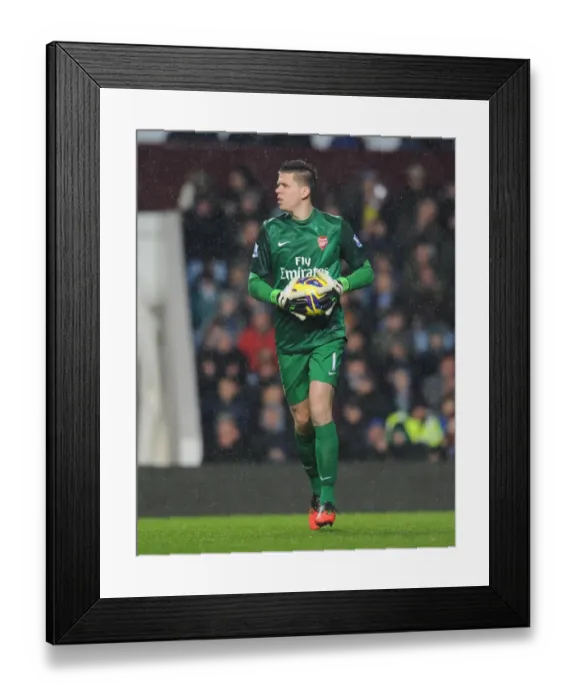 Framed Print : Arsenal's Wojciech Szczesny in Action Against Aston Villa (2012-13) Framed Print : Arsenal's Wojciech Szczesny in Action Against Aston Villa (2012-13)