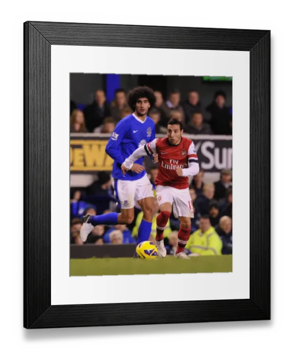 Framed Print : Santi Cazorla Outmaneuvers Marouane Fellaini: Everton vs Arsenal, Premier League 2012-13