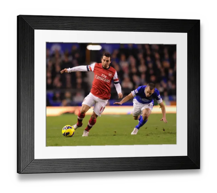 Framed Print : Santi Cazorla Dashes Past Bryan Oviedo: Everton vs Arsenal, Premier League 2012-13 Framed Print : Santi Cazorla Dashes Past Bryan Oviedo: Everton vs Arsenal, Premier League 2012-13
