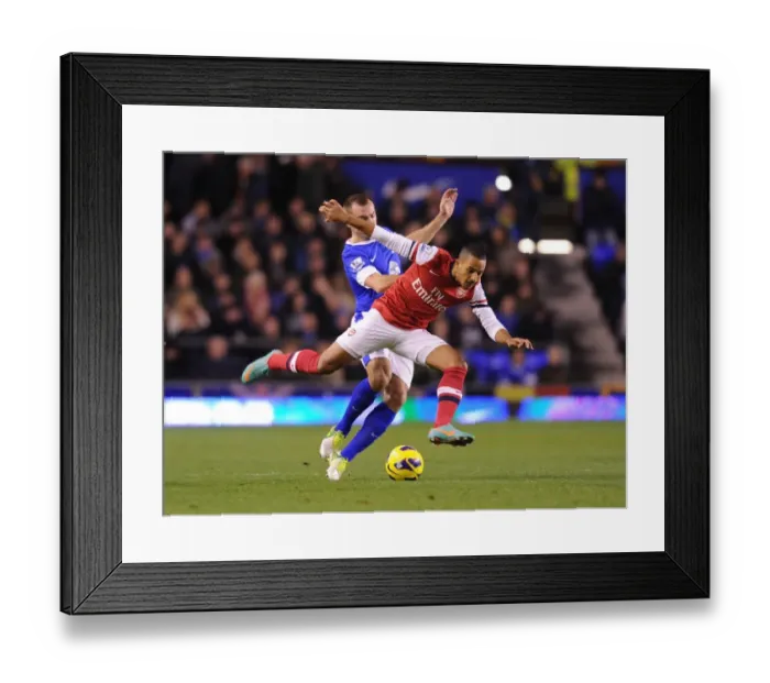 Framed Print : Theo Walcott Dashes Past Darren Gibson: Everton vs. Arsenal, Premier League 2012-13 Framed Print : Theo Walcott Dashes Past Darren Gibson: Everton vs. Arsenal, Premier League 2012-13