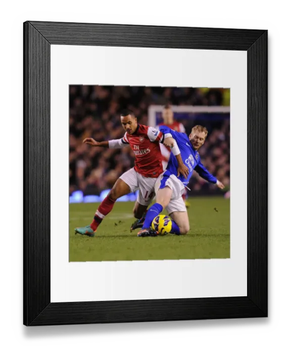 Framed Print : Theo Walcott vs. Tony Hibbert: Everton vs. Arsenal, Premier League Clash (2012-13)
