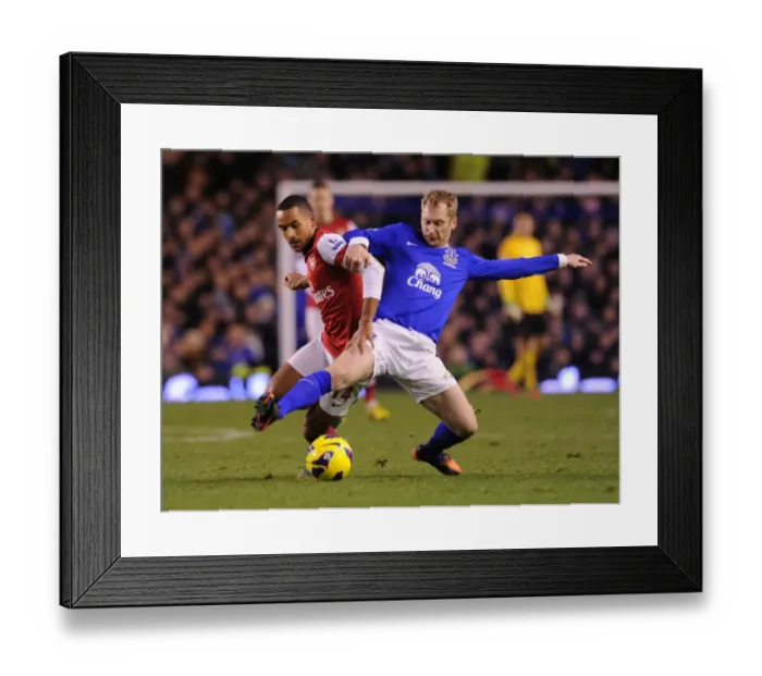 Framed Print : Theo Walcott vs. Tony Hibbert: A Football Rivalry at Goodison Park, Premier League 2012-13 Framed Print : Theo Walcott vs. Tony Hibbert: A Football Rivalry at Goodison Park, Premier League 2012-13