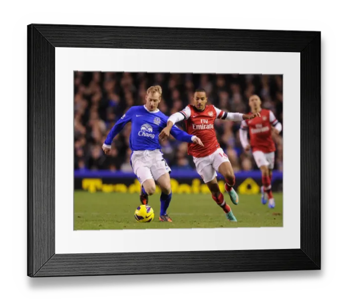 Framed Print : Theo Walcott vs. Tony Hibbert: Intense Battle at Goodison Park (Everton vs. Arsenal, 2012-13) Framed Print : Theo Walcott vs. Tony Hibbert: Intense Battle at Goodison Park (Everton vs. Arsenal, 2012-13)