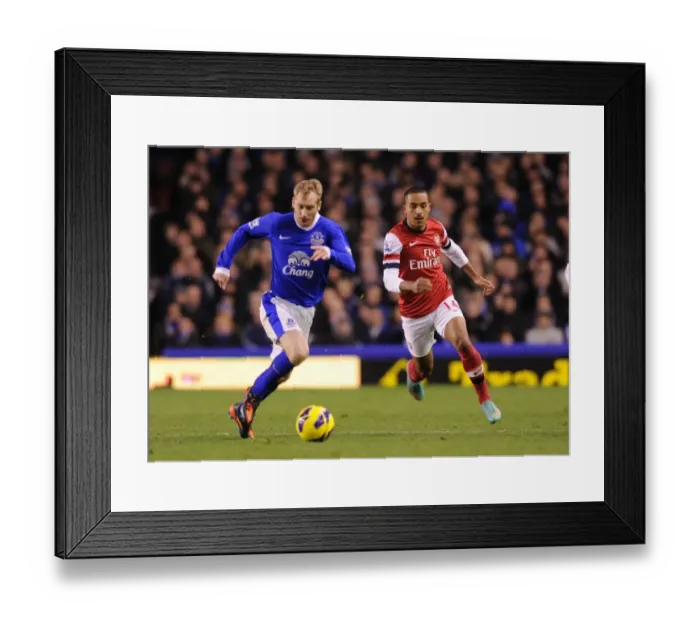 Framed Print : Theo Walcott vs. Tony Hibbert: A Football Rivalry at Goodison Park (Everton vs. Arsenal, 2012-13)