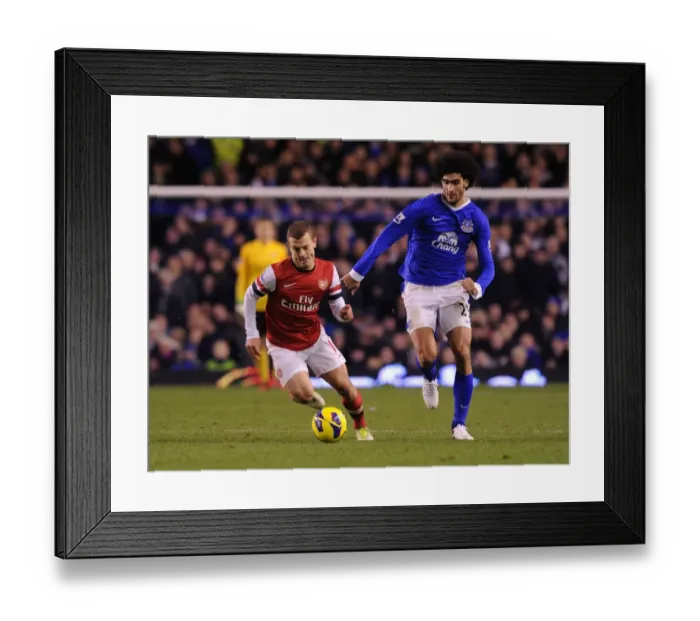 Framed Print : Jack Wilshere Outmaneuvers Marouane Fellaini: Everton vs Arsenal, Premier League 2012-13