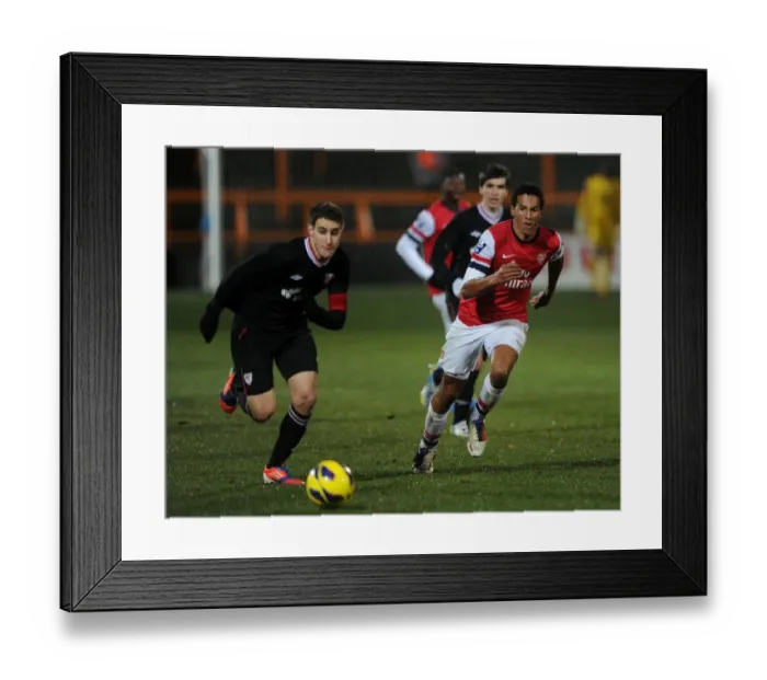 Framed Print : Isaac Hayden vs. Ander Artabe: Clash of Young Talents in Arsenal U19 vs. Athletico Bilbao U19 (NextGen Series)