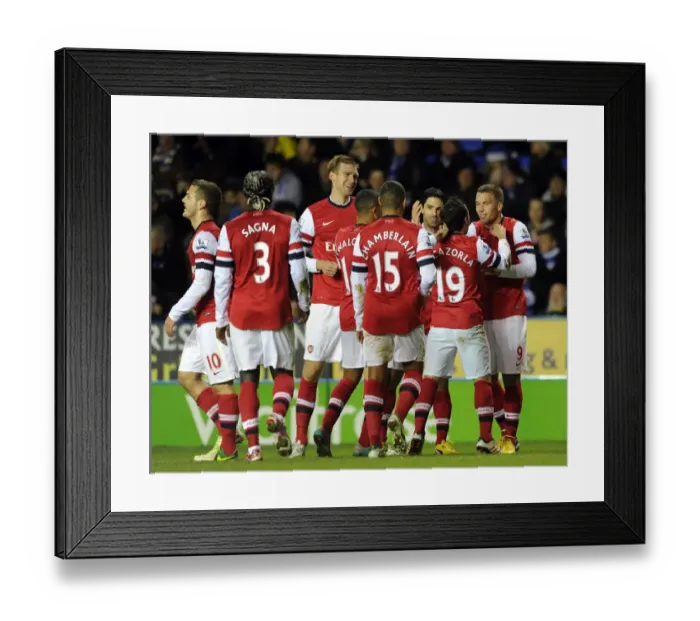 Framed Print : Cazorla and Podolski Celebrate Arsenal's Winning Goals Against Reading (2012-13)