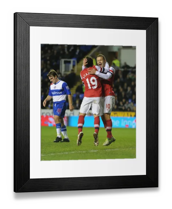 Framed Print : Cazorla and Wilshere Celebrate Arsenal's Four-Goal Blitz Against Reading (2012-13)