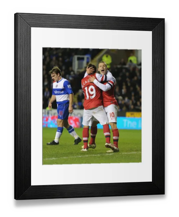 Framed Print : Cazorla and Wilshere: Unforgettable Moment as Arsenal Scored Their Fourth Goal Against Reading (2012-13) Framed Print : Cazorla and Wilshere: Unforgettable Moment as Arsenal Scored Their Fourth Goal Against Reading (2012-13)