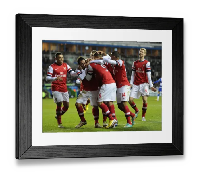 Framed Print : Celebrating Glory: Cazorla and Podolski's Euphoric Dance after Arsenal's Thrilling Victory at Reading (2012-13)