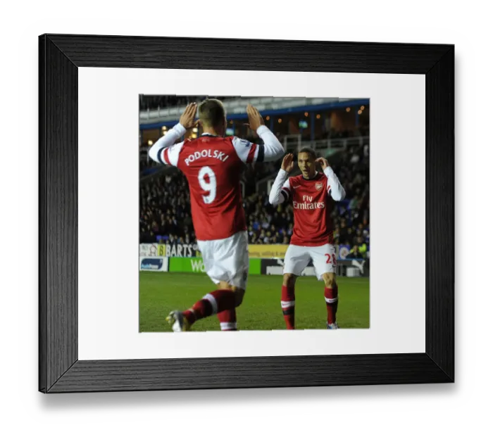 Framed Print : Podolski Scores First: Arsenal's Victory at Reading (2012-13) Framed Print : Podolski Scores First: Arsenal's Victory at Reading (2012-13)