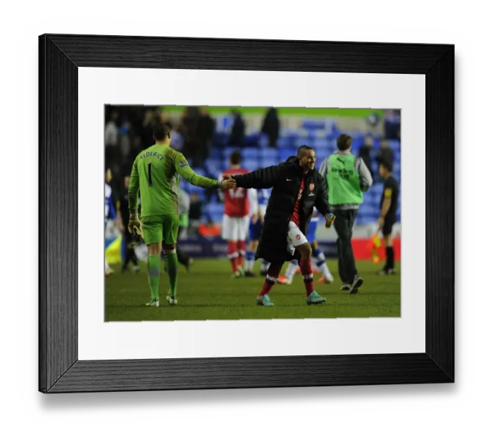 Framed Print : Theo Walcott and Adam Federici: A Moment of Sportsmanship in the Reading vs. Arsenal Premier League Match (2012-13) Framed Print : Theo Walcott and Adam Federici: A Moment of Sportsmanship in the Reading vs. Arsenal Premier League Match (2012-13)