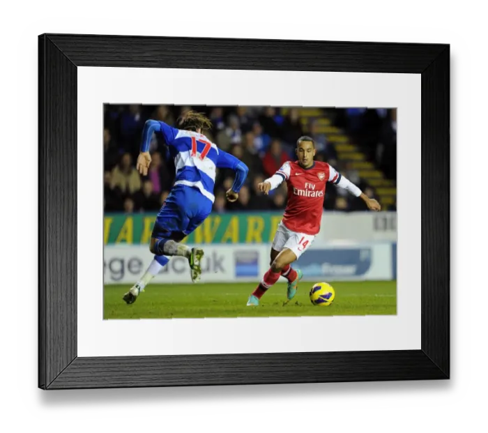 Framed Print : Theo Walcott Scores Past Kaspars Gorkss: Reading vs. Arsenal, Premier League 2012-13