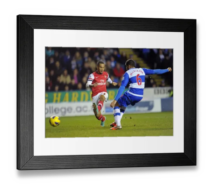 Framed Print : Theo Walcott Scores Fifth Goal Past Adrian Mariappa in Reading vs. Arsenal (2012-13)