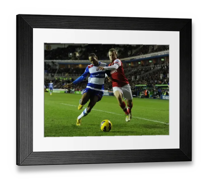 Framed Print : Jack Wilshere vs. Jimmy Kebe: Intense Battle in Reading vs. Arsenal (2012-13 Premier League) Framed Print : Jack Wilshere vs. Jimmy Kebe: Intense Battle in Reading vs. Arsenal (2012-13 Premier League)