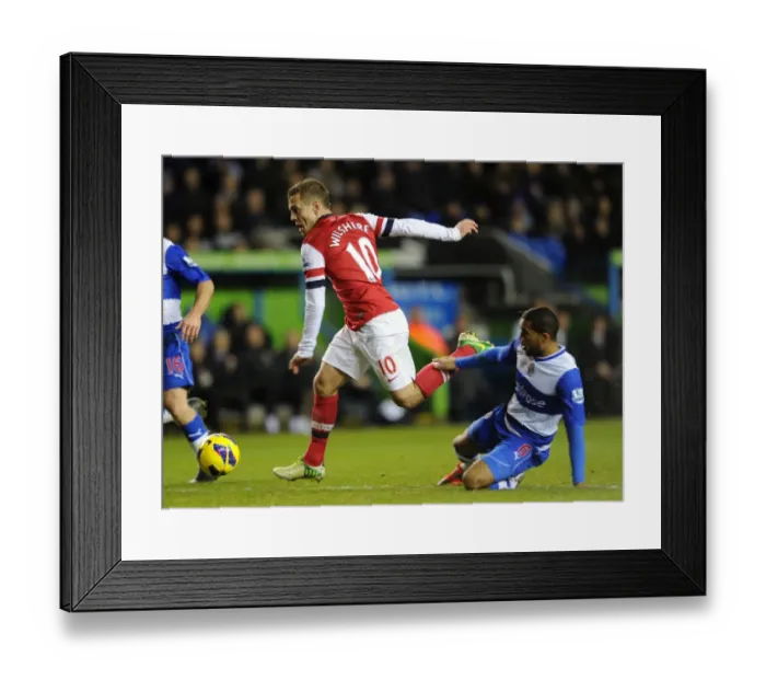 Framed Print : Clash on the Pitch: Wilshere vs Mariappa - Reading vs Arsenal, Premier League 2012-13 Framed Print : Clash on the Pitch: Wilshere vs Mariappa - Reading vs Arsenal, Premier League 2012-13