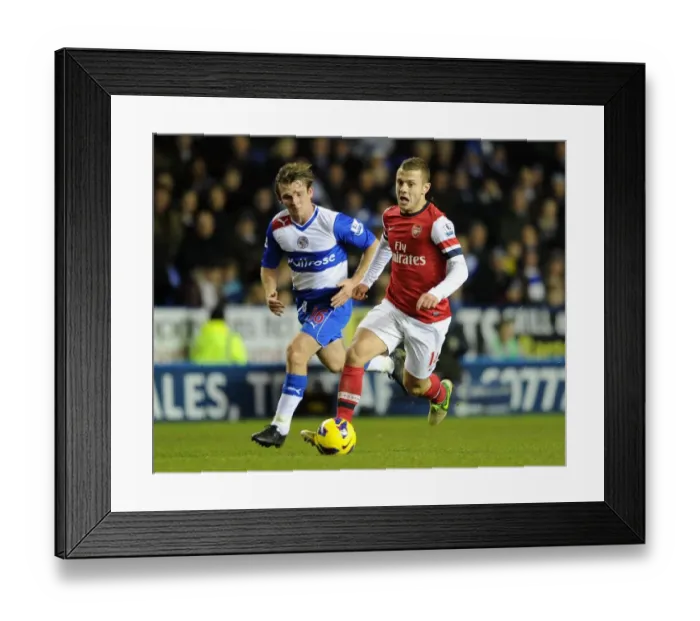Framed Print : Jack Wilshere Outpaces Jay Tabb: Reading vs Arsenal, Premier League 2012-13