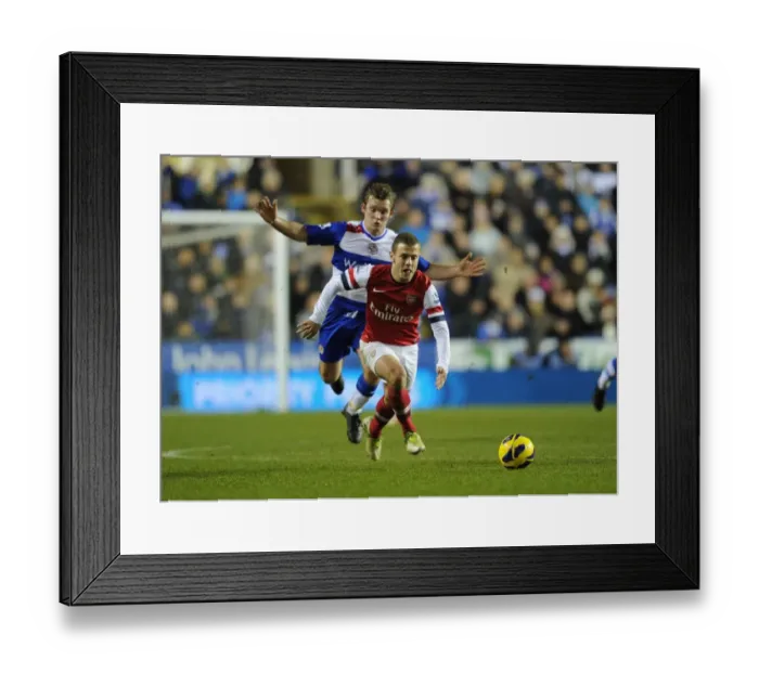 Framed Print : Jack Wilshere Breaks Past Reading's Jay Tabb: Arsenal vs. Reading, Premier League 2012-13