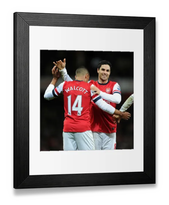 Framed Print : Mikel Arteta congratulates Theo Walcott (Arsenal) on his cross for Olivier Girouds 1st goal Framed Print : Mikel Arteta congratulates Theo Walcott (Arsenal) on his cross for Olivier Girouds 1st goal