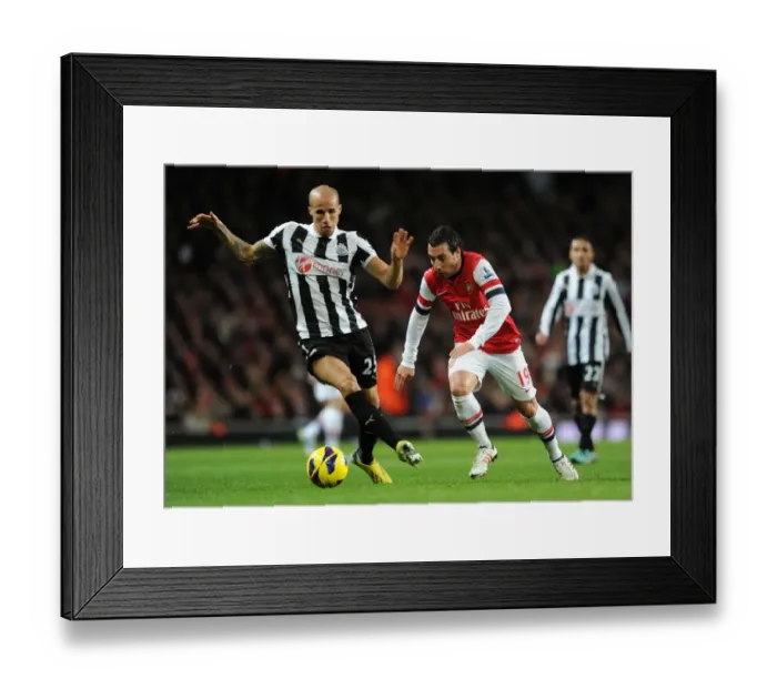 Framed Print : Santi Cazorla vs. Gabriel Obertan: Battle in the Midfield - Arsenal v Newcastle United (2012-13) Framed Print : Santi Cazorla vs. Gabriel Obertan: Battle in the Midfield - Arsenal v Newcastle United (2012-13)