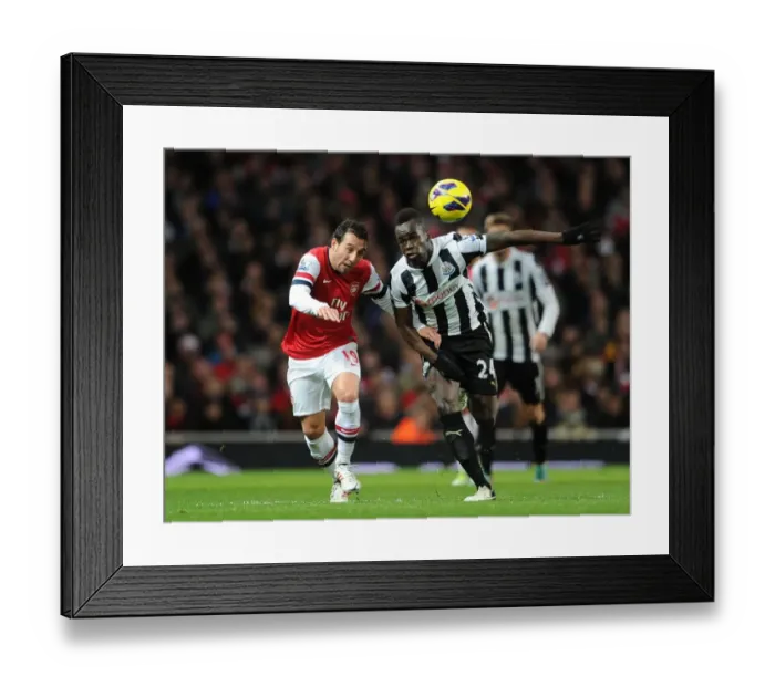 Framed Print : Clash of Midfield Titans: Santi Cazorla vs. Cheick Tiote (Arsenal vs. Newcastle United, 2012-13) Framed Print : Clash of Midfield Titans: Santi Cazorla vs. Cheick Tiote (Arsenal vs. Newcastle United, 2012-13)
