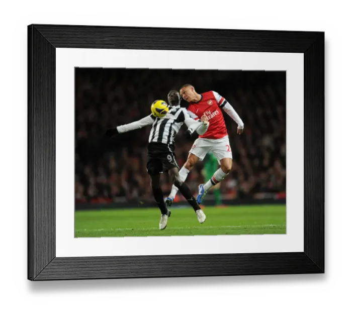 Framed Print : Arsenal vs Newcastle United: Clash Between Kieran Gibbs and Papiss Cisse Framed Print : Arsenal vs Newcastle United: Clash Between Kieran Gibbs and Papiss Cisse