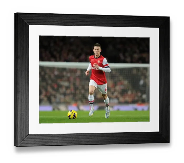 Framed Print : Arsenal's Koscielny in Action against Newcastle United (2012-13)