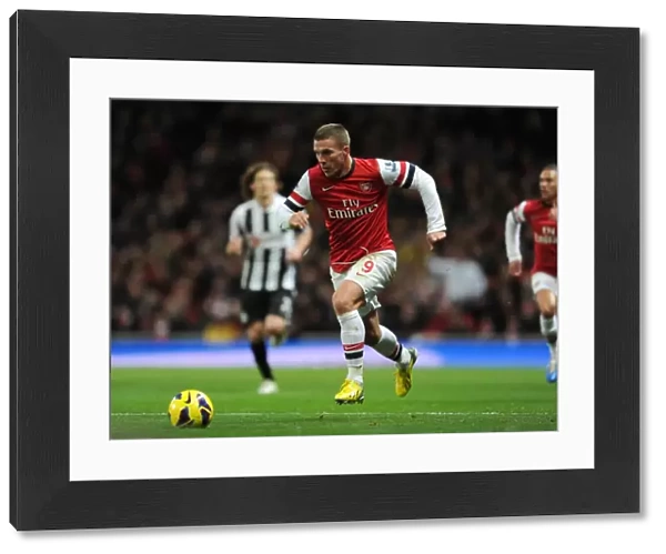 Lukas Podolski (Arsenal). Arsenal 7: 3 Newcastle United. Barclays Premier League. Emirates Stadium