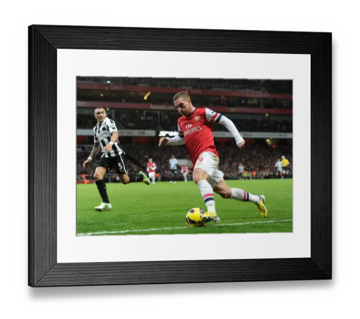 Framed Print : Lukas Podolski in Action: Arsenal vs Newcastle United, Premier League 2012-13