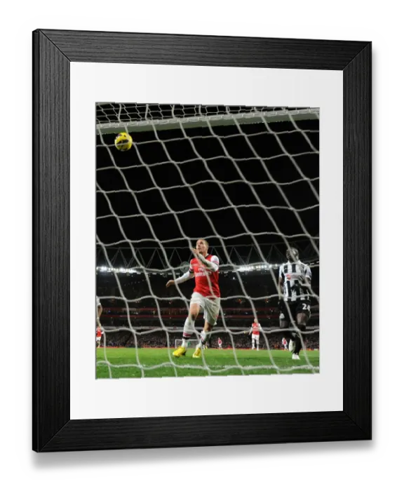 Framed Print : Lukas Podolski's Hat-Trick: Arsenal Crushes Newcastle United in Premier League (December 2012) Framed Print : Lukas Podolski's Hat-Trick: Arsenal Crushes Newcastle United in Premier League (December 2012)