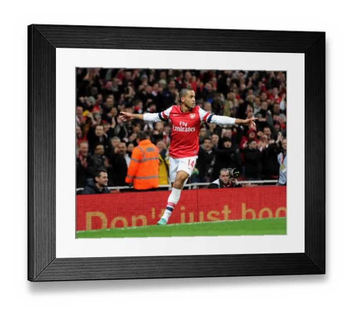 Framed Print : Theo Walcott celebrates scoring Arsenals 1st goal. Arsenal 7: 3 Newcastle United Framed Print : Theo Walcott celebrates scoring Arsenals 1st goal. Arsenal 7: 3 Newcastle United