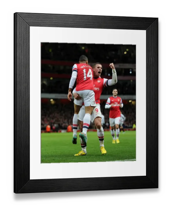 Framed Print : Arsenal Duo Theo Walcott and Lukas Podolski Celebrate First Goal vs Newcastle United (2012-13) Framed Print : Arsenal Duo Theo Walcott and Lukas Podolski Celebrate First Goal vs Newcastle United (2012-13)