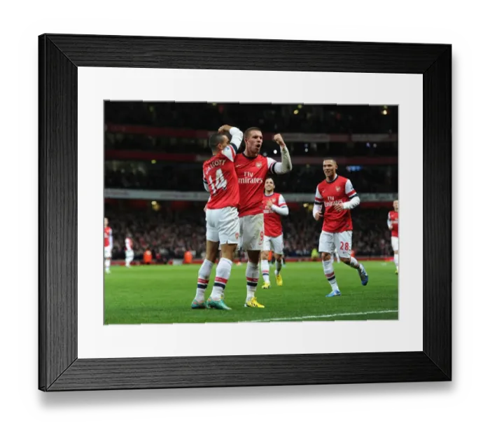 Framed Print : Arsenal Stars: Walcott and Podolski Celebrate First Goal Against Newcastle United (2012-13) Framed Print : Arsenal Stars: Walcott and Podolski Celebrate First Goal Against Newcastle United (2012-13)