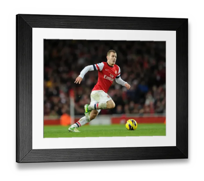 Framed Print : AJack Wilshere (Arsenal). Arsenal 7: 3 Newcastle United. Barclays Premier League. Emirates Stadium