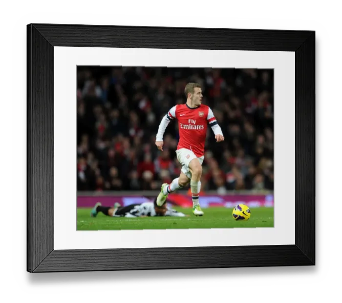 Framed Print : Jack Wilshere (Arsenal). Arsenal 7: 3 Newcastle United. Barclays Premier League. Emirates Stadium