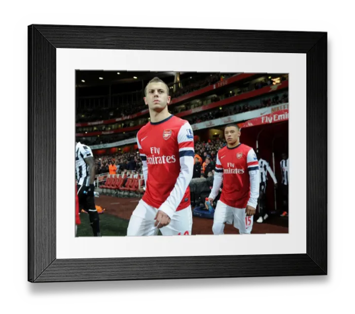 Framed Print : Arsenal's Midfield Dynamos: Jack Wilshere and Alex Oxlade-Chamberlain in Action against Newcastle United (2012-13) Framed Print : Arsenal's Midfield Dynamos: Jack Wilshere and Alex Oxlade-Chamberlain in Action against Newcastle United (2012-13)