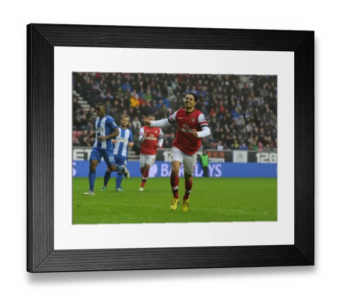 Framed Print : Mikel Arteta Scores the Winner: Wigan Athletic vs. Arsenal, Premier League 2012-13