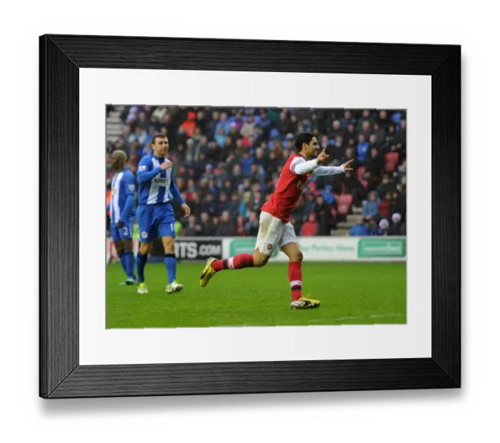 Framed Print : Mikel Arteta Scores Penalty: Wigan Athletic vs Arsenal, Premier League 2012-13