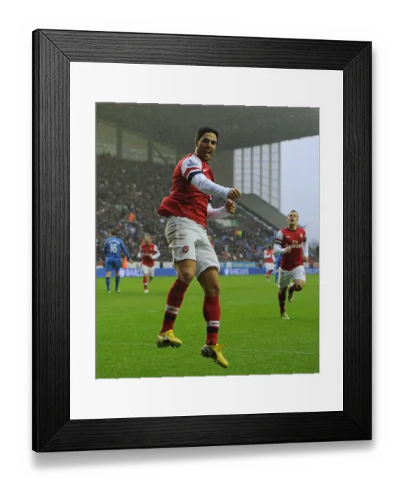 Framed Print : Mikel Arteta's Last-Minute Dramatics: Wigan Athletic vs. Arsenal, Premier League 2012-13 Framed Print : Mikel Arteta's Last-Minute Dramatics: Wigan Athletic vs. Arsenal, Premier League 2012-13