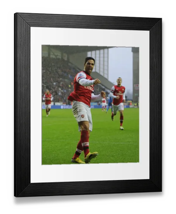 Framed Print : Mikel Arteta's Game-Winning Goal: Arsenal's Triumph at Wigan Athletic, Premier League 2012-13 Framed Print : Mikel Arteta's Game-Winning Goal: Arsenal's Triumph at Wigan Athletic, Premier League 2012-13