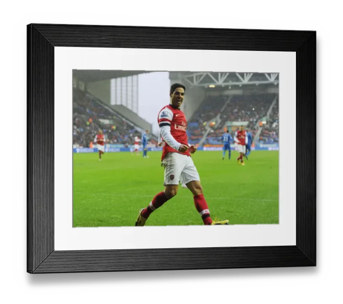 Framed Print : Mikel Arteta's Game-Winning Goal: Arsenal's Triumph at Wigan Athletic, Premier League 2012-13