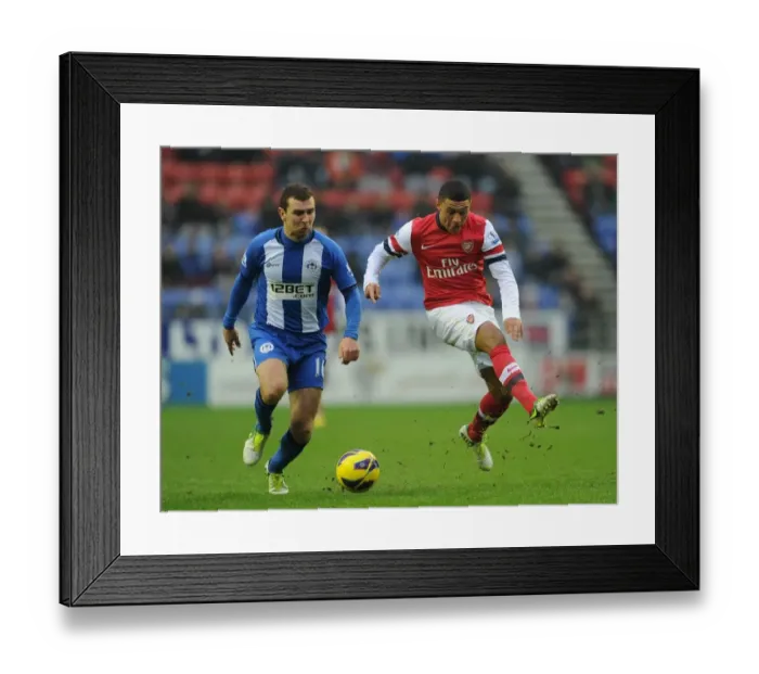 Framed Print : Arsenal's Oxlade-Chamberlain Fouls by McArthur in Wigan Clash (2012-13)